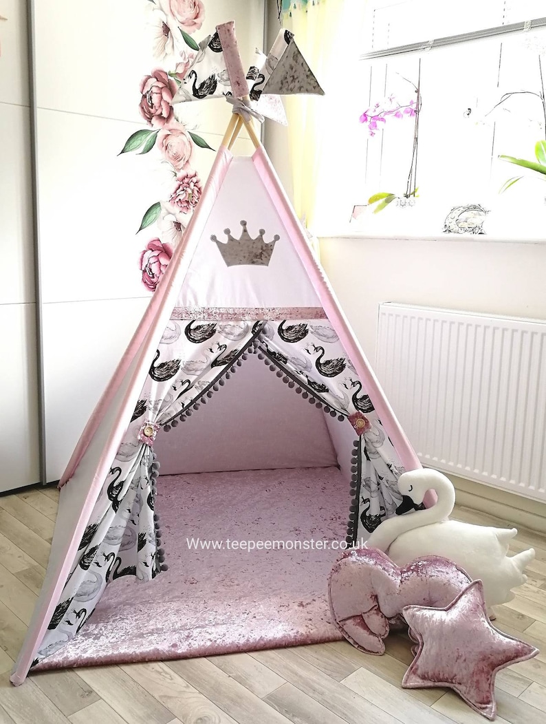 pink and white striped teepee