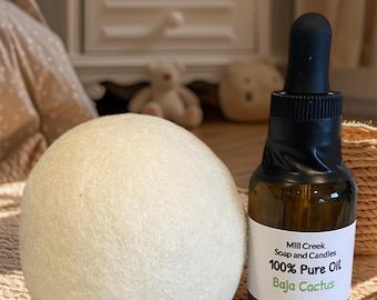 May include: A white wool dryer ball and a glass bottle of 100% pure Baja Cactus oil from Mill Creek Soap and Candles.