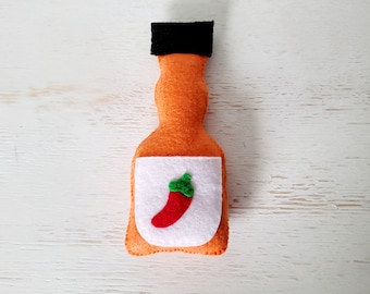 Juguete para gatos con salsa picante