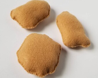 Giocattoli per gatti a forma di crocchette di pollo