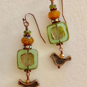 Green Czech Glass Earrings, Peridot Green Premium Picasso Beads, Metallic Gold Etched, Antique Copper Bird Charm, Rhinestone Rondelles