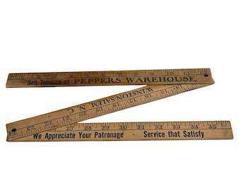 Vintage folding wooden yardstick advertising for "Peppers Warehouse"