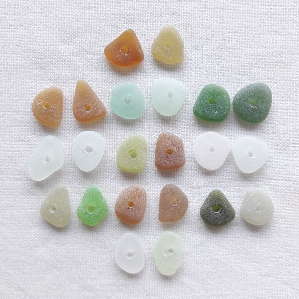 Real sea glass drilled about 1cm, drilled in the center, 22 multicolored polished sea glass beads. Jewelry making kit.