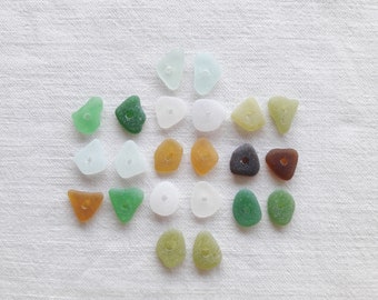 Genuine sea glass drilled 1cm, pierced in the center, 22 seaglass beads. Lot for jewelry.