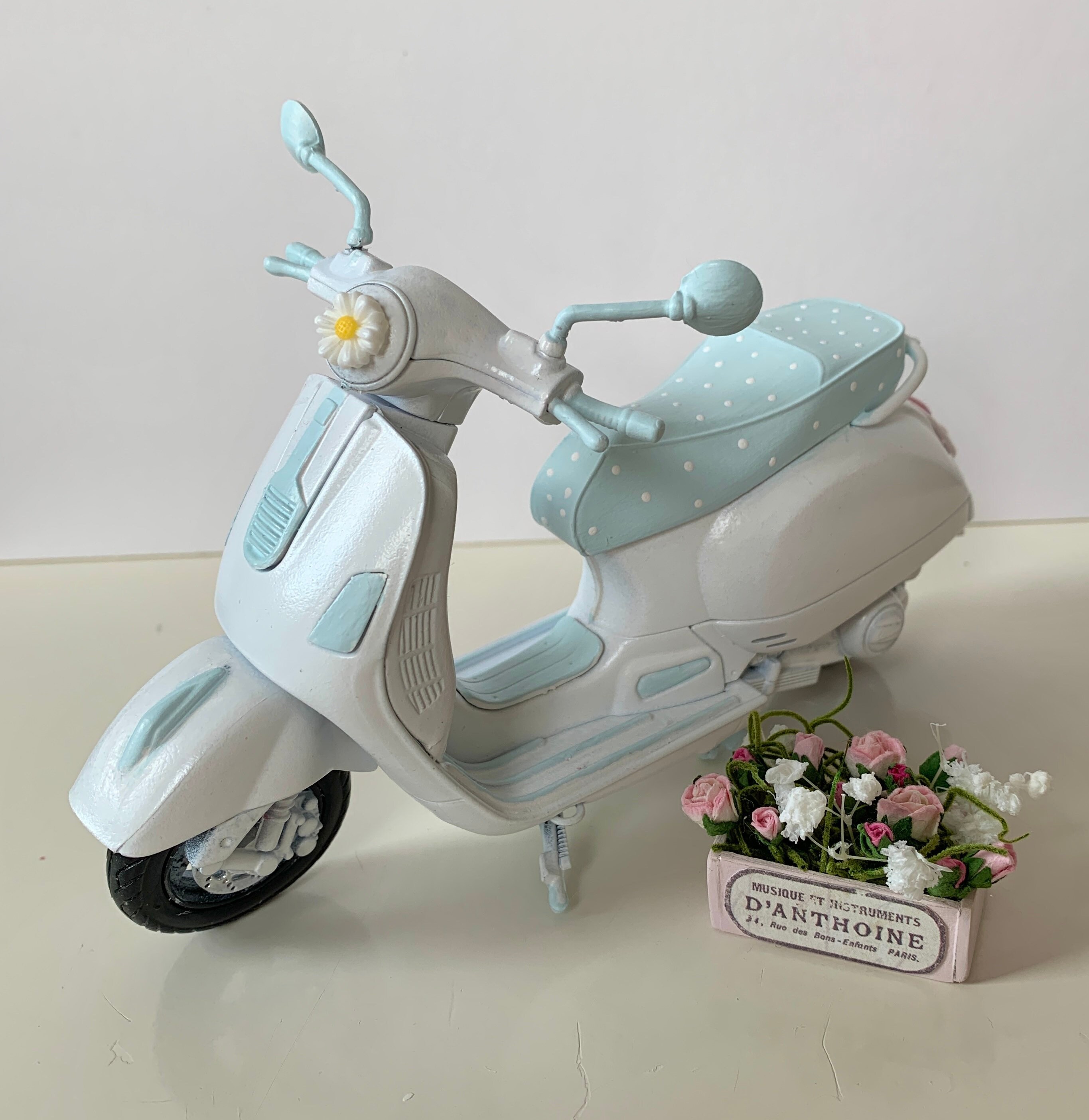 The Unique Vespa S Miniature Made from Wood with White Background