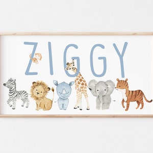 May include: A light blue personalized name print with the name "Ziggy" spelled out in large letters.  The letters are decorated with a variety of safari animals including a monkey, lion, rhino, giraffe, elephant, and tiger.