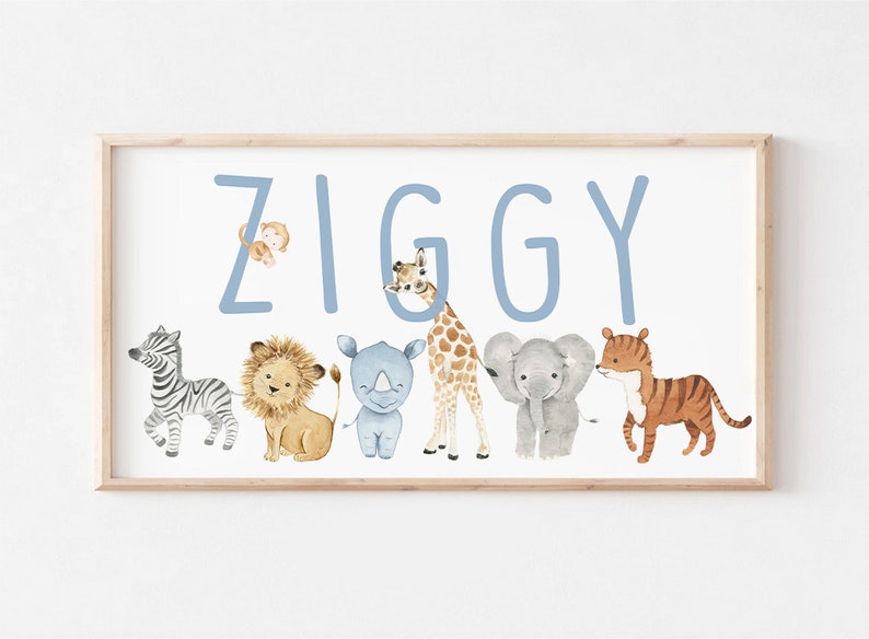 May include: A light blue personalized name print with the name "Ziggy" spelled out in large letters.  The letters are decorated with a variety of safari animals including a monkey, lion, rhino, giraffe, elephant, and tiger.