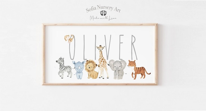 May include: A personalized nursery print with the name "Oliver" in gray text. The letters are decorated with various jungle animals, including a zebra, rhino, lion, giraffe, elephant, and tiger. The print is framed in a light wood frame.