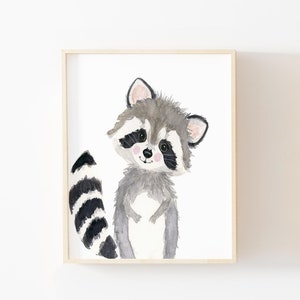 May include: A watercolor painting of a cute raccoon with a black and white striped tail. The raccoon is standing on a white background and has a friendly expression on its face.
