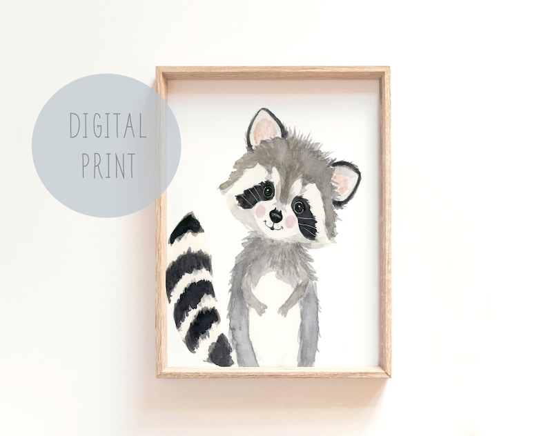 May include: A watercolor illustration of a cute raccoon with a black and white striped tail. The raccoon is looking to the left and has a friendly expression. The illustration is framed in a light wood frame.