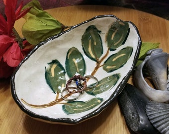 Small artisan made stoneware jewelry dish with hand painted leaf design