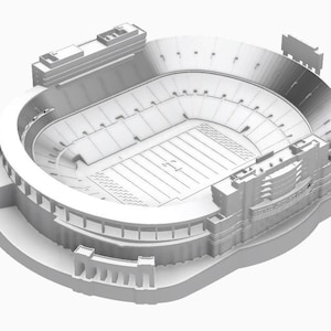 May include: A white 3D model of a football stadium with a pitch and stands.