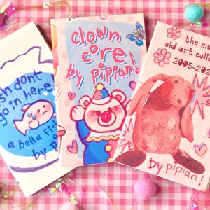 8 page zines! old art zine, fishkeeping zine, and clown zine