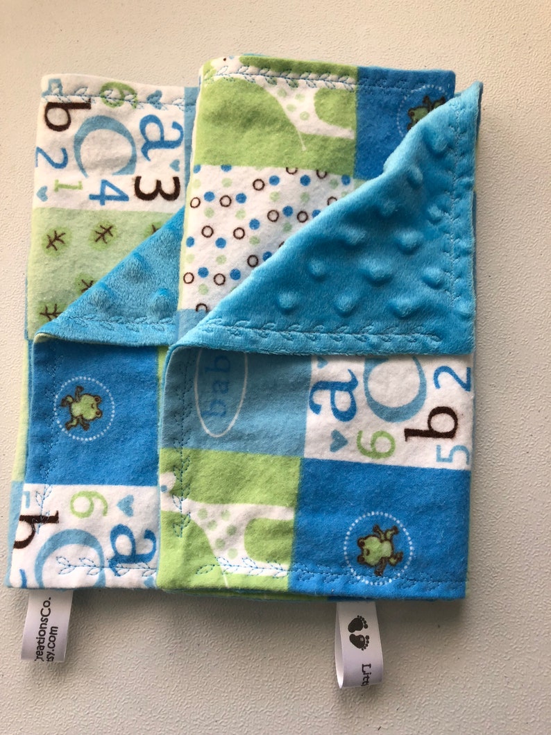 Blue green and white blocks with ABC/'s and giraffes burp clothes and changing pad cover