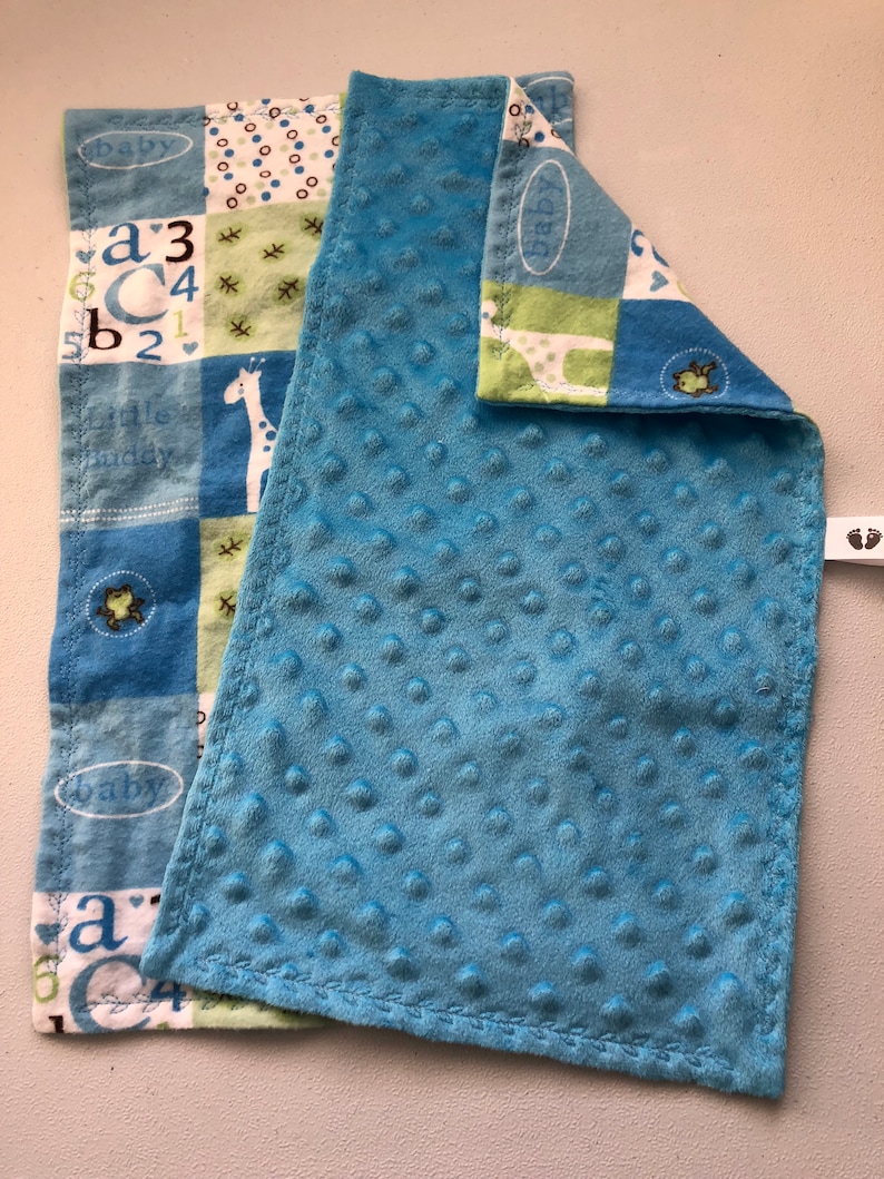 Blue green and white blocks with ABC/'s and giraffes burp clothes and changing pad cover