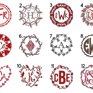 May include: A collection of twelve monogram designs in various styles. The designs feature initials within decorative frames, including hearts, floral patterns, and circular shapes. Colors range from red and brown to black and pink.