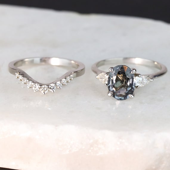 Curved wedding band for oval ring deals