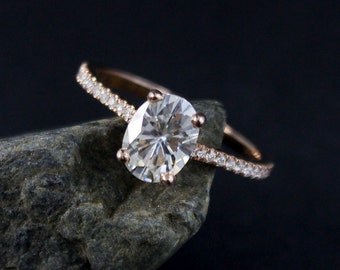 Forever One Oval Moissanite Ring: Rose Gold Solitaire Engagement Ring