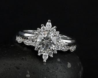 Anillo de compromiso con zafiro blanco: banda de hojas de diamantes estilo art déco