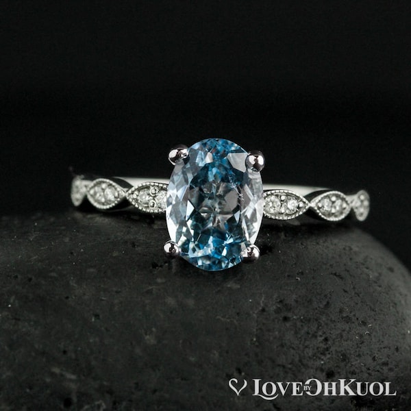 Oval Aquamarine Engagement Ring: Diamond Leaf Band, 14k Gold Solitaire