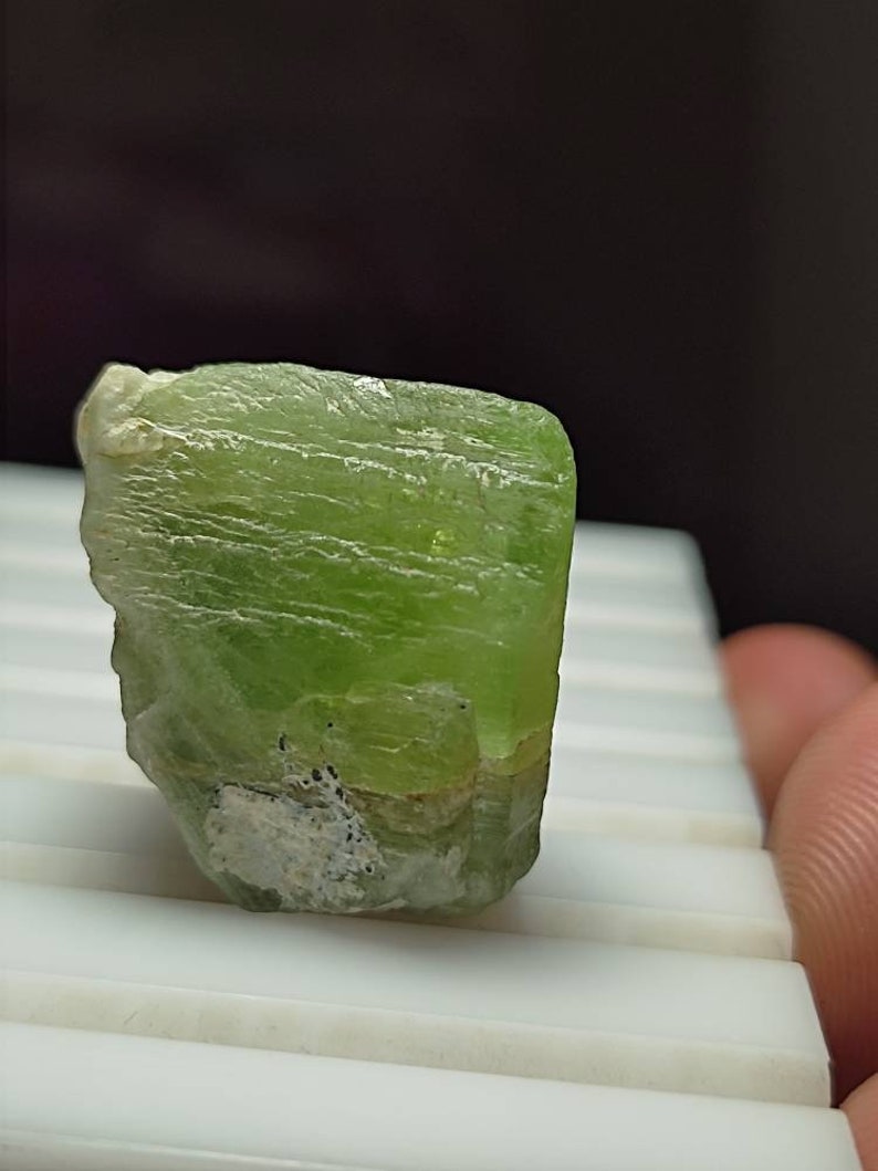 64 CRT Beautiful peridot Rough crystal combined lovely with self standing position from kpk Pakistan