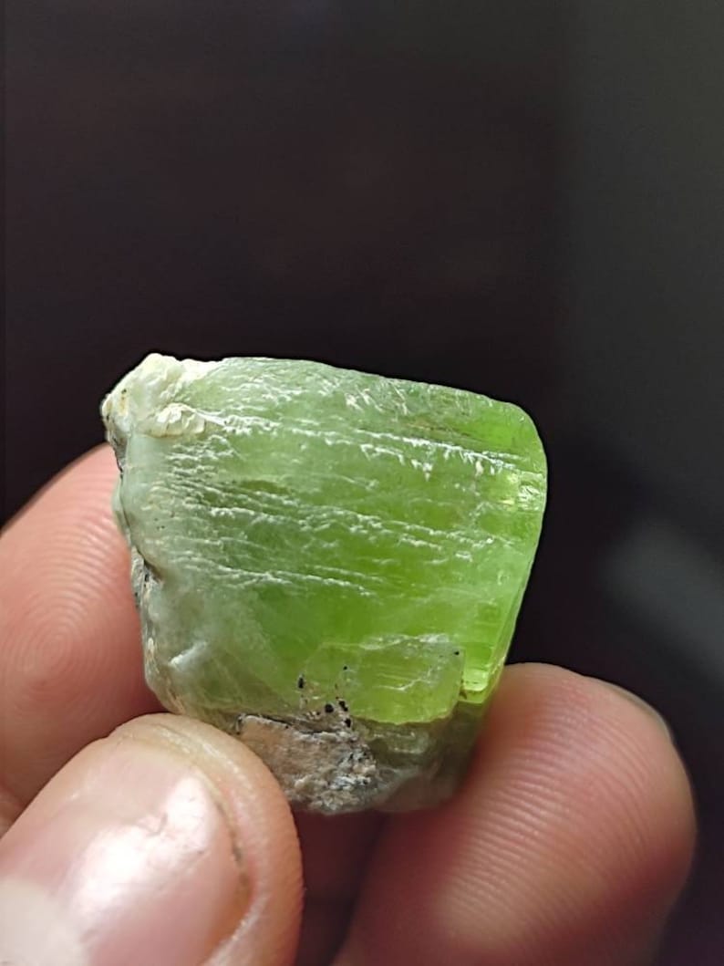 64 CRT Beautiful peridot Rough crystal combined lovely with self standing position from kpk Pakistan