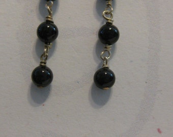 Black and silver drop earrings