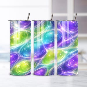 May include: Three stainless steel insulated tumblers with a vibrant, abstract design. The pattern features a flowing network of colorful, glowing orbs in shades of purple, blue, green, and yellow. Each tumbler has a silver straw and a matching lid.