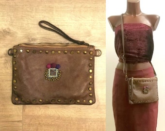 Distressed leather wristlet purse, with kuchi decor, studs and pompoms