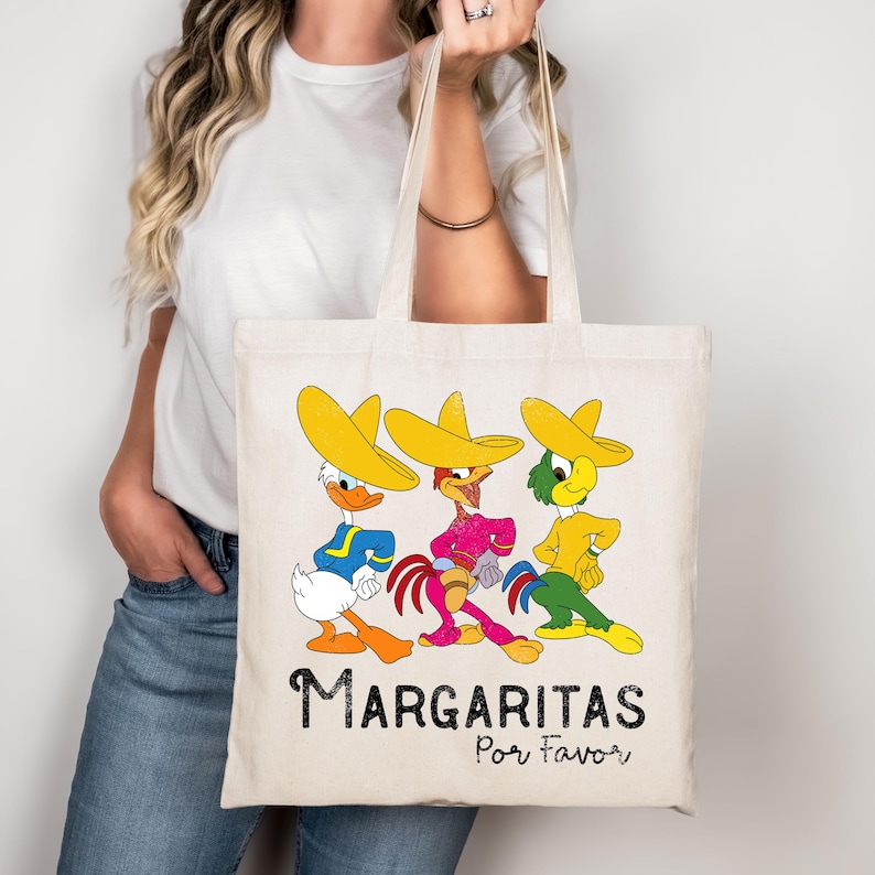 tote bag is ivory in color with a vibrant print
