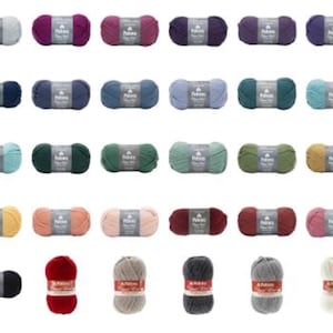 May include: A collection of colorful yarn skeins in various shades, including purple, blue, green, yellow, and red. Each skein is labeled with a product tag. Ideal for knitting and crochet projects.