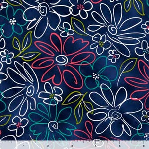 May include: A navy blue fabric with a white, pink, and teal floral pattern. The flowers are drawn in a simple, abstract style.