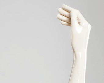 Long gloves made of molded latex in white color