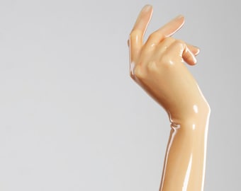 Long gloves made of molded latex in natural translucent color