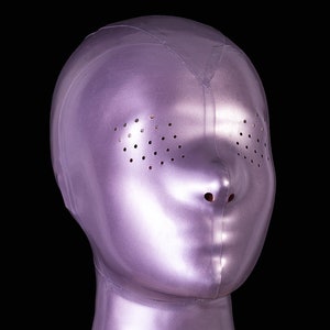 Mask with perforated eyes and mouth closed