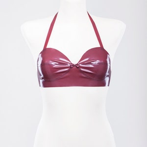Latex bra decorated with small bow