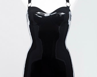 Latex dress decorated with metal rings