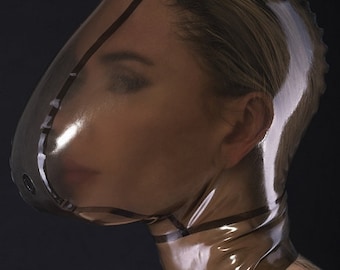 Latex ecstasy mask without zipper and with a small hole for breath control