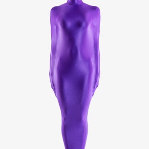 Shiny spandex bondage body bag with internal arm sleeves.