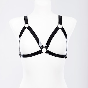Latex harness bra with metallic rings