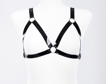 Latex harness bra with metallic rings