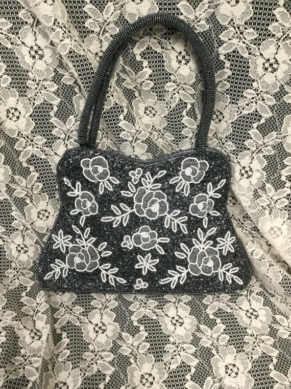 navy floral handbag