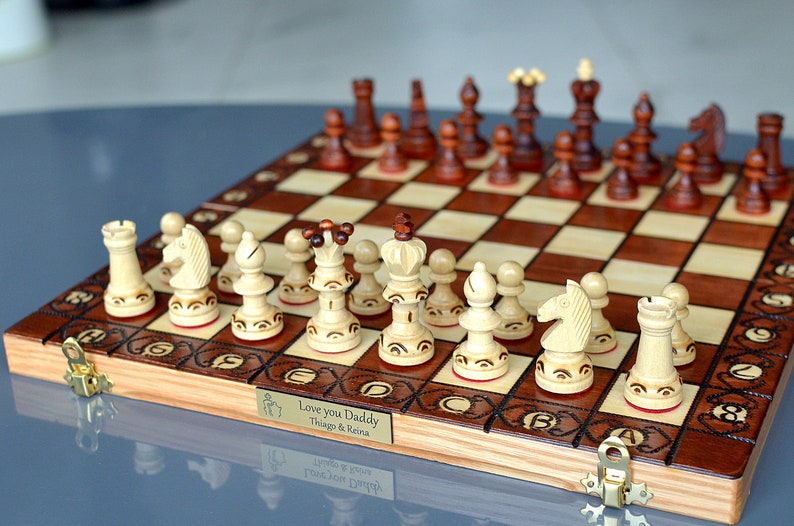 A chess set made of hornbeam wood and beech wood, and engraved name is the perfect gift for your beloved older man