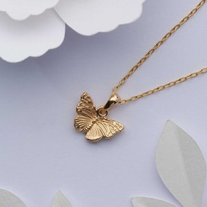 Small gold butterfly necklace. 18k gold on solid 925 sterling silver charm.