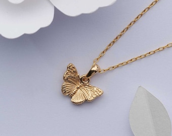 Small gold butterfly necklace. 18k gold on solid 925 sterling silver charm.