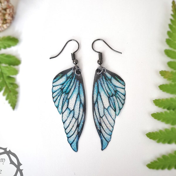Ice Queen glitter fairy wing earrings. Blue butterfly wing earrings. Magical faery, fae jewellery. Mori girl, fantasy festival, jewellery