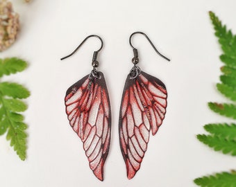 Red fairy wing earrings. Handmade glittery fairy wings on a choice of ear wires.