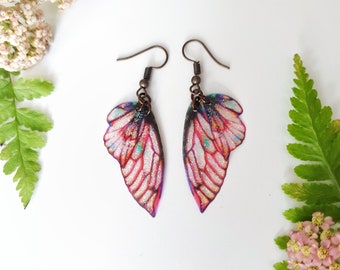 Red petal glitter fairy wing earrings. Handmade fairy wings on a choice of ear wires.