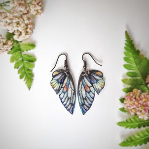 Dark blue petal fairy wing earrings. Blue faerie glitter wings.  Boho witch, faery, fae jewellery. Magical butterfly wing earrings gift