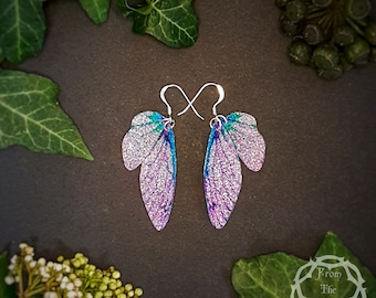 Small pink and turquoise training wings. Handmade sparkle fairy wing earrings. Unusual magical faerie jewellery gift for an enchanted friend